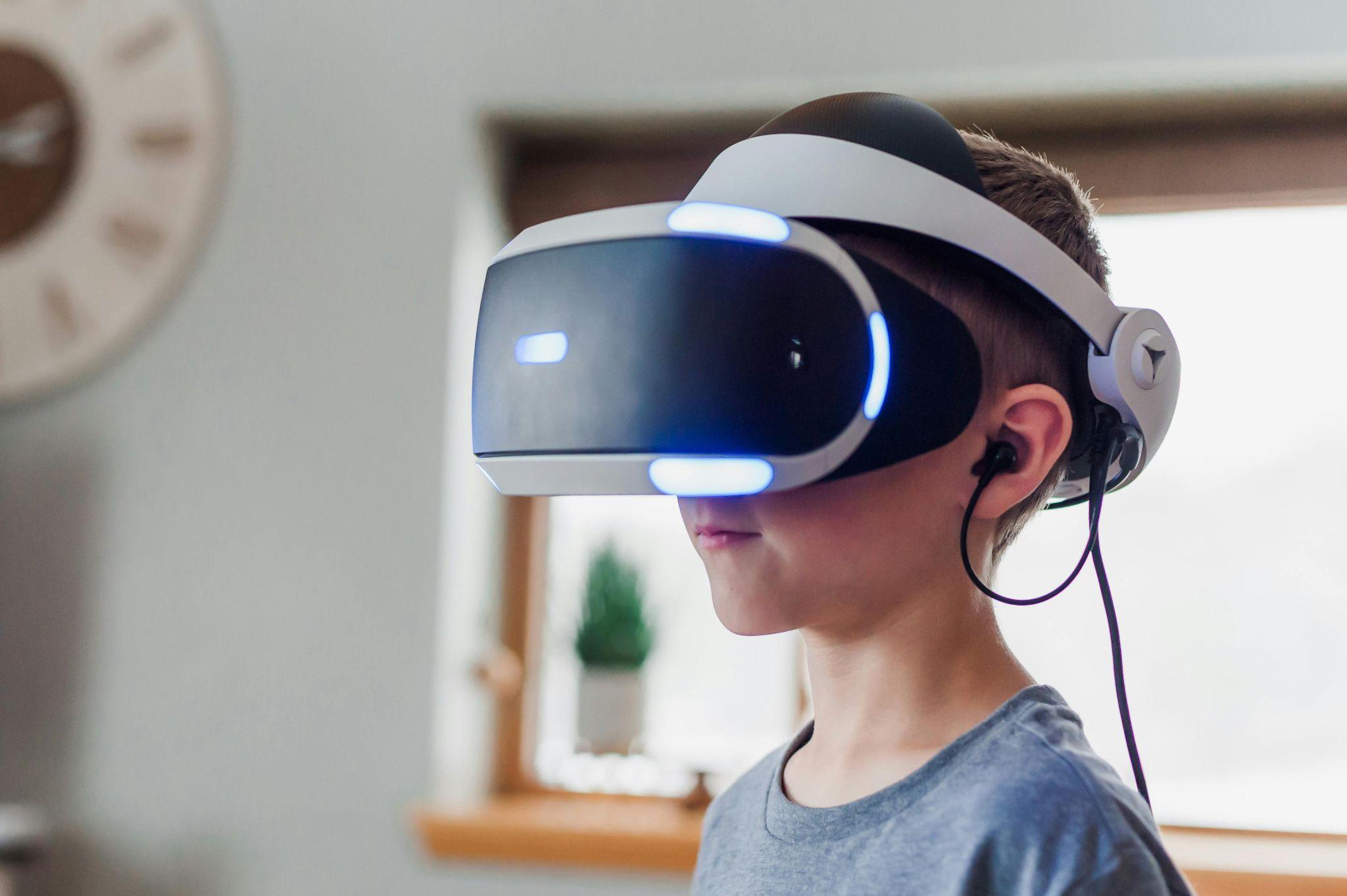Kid with virtual reality setup on.