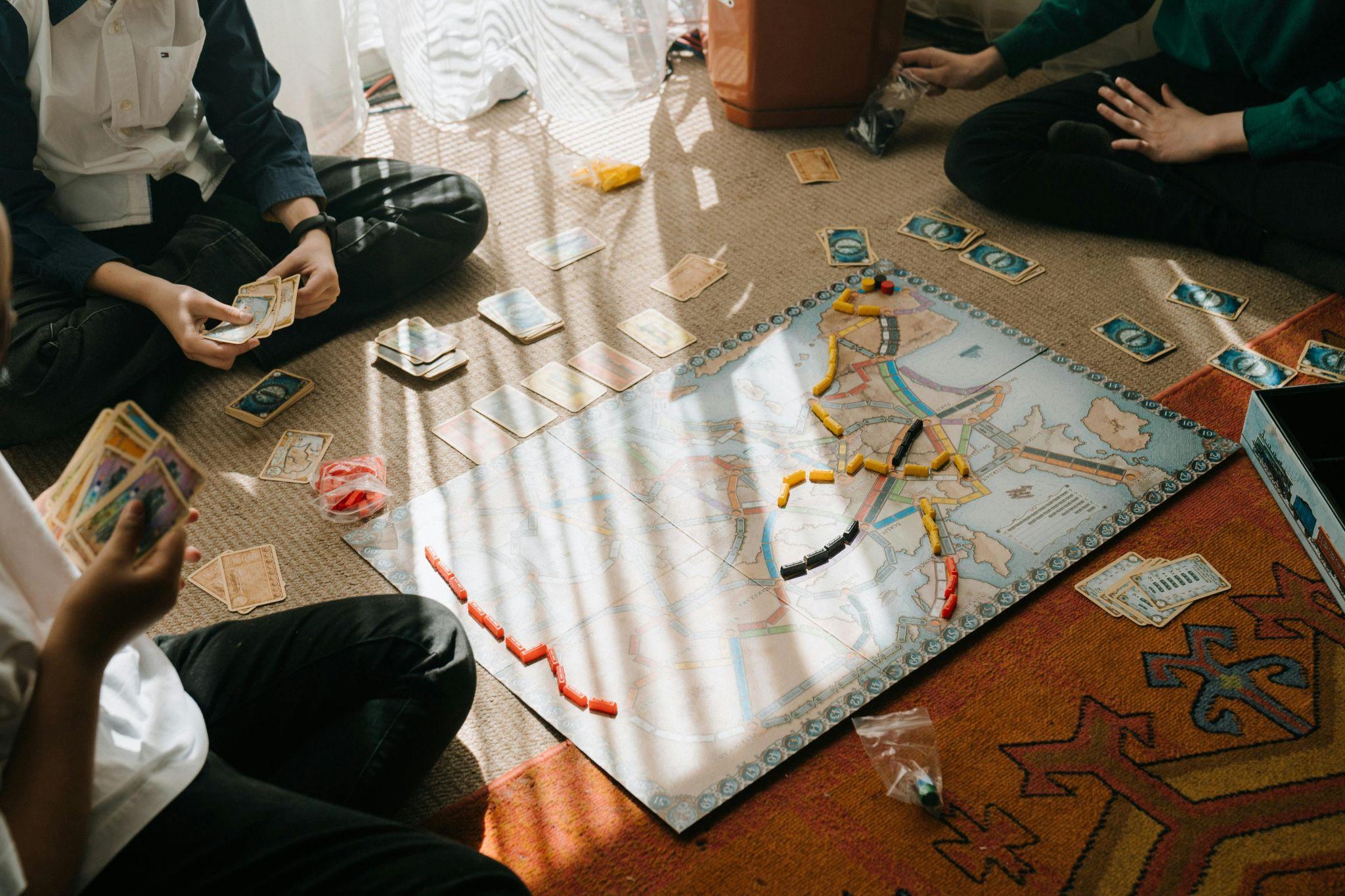 People play a board game.